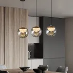 Серия подвесных светильников с LED-источниками света в полусферических рассеивателях с эффектом льда внутри шарообразных плафонов из тонированного стекла MAYER ORB L13 от ImperiumLoft
