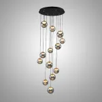 Серия подвесных светильников с LED-источниками света в полусферических рассеивателях с эффектом льда внутри шарообразных плафонов из тонированного стекла MAYER ORB L13 от ImperiumLoft