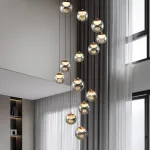 Серия подвесных светильников с LED-источниками света в полусферических рассеивателях с эффектом льда внутри шарообразных плафонов из тонированного стекла MAYER ORB L13 от ImperiumLoft