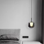 Серия подвесных светодиодных светильников с молочно-белым рассеивателем внутри плафона из дымчатого стекла GEERT D20