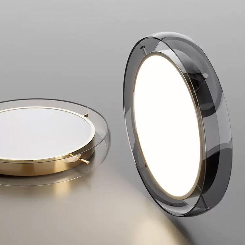 Серия подвесных светодиодных светильников с дисковидным металлическим корпусом, обрамленным стеклянным обручем SCOTT Gold