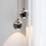 Серия подвесных LED светильников с регулировкой высоты подвеса и шарообразным плафоном с линзированным источником света MARELIUS Black 3000-4000-6000К