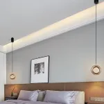 Серия подвесных светильников кольцевой формы с LED-подсветкой по внутреннему контуру и направленным вниз линзированным источников света BOSSE Black