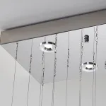 Серия инсталляций из подвесных хрустальных цветов, подсвеченных светодиодными источниками, расположенными на прямоугольном креплении CHARA L100 от ImperiumLoft