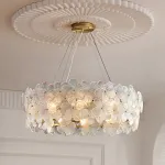 Серия люстр с цветочным декором из прозрачного и окрашенного стекла на кольцевом латунном каркасе TOTTI LUX D60 от ImperiumLoft