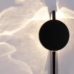 Серия интерьерных настенных светильников, создающих оригинальные световые эффекты за счет поворотного рассеивателя FRIPPE C Silver