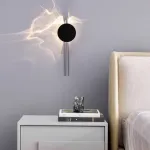 Серия интерьерных настенных светильников, создающих оригинальные световые эффекты за счет поворотного рассеивателя FRIPPE C Silver