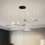 Серия кольцевых люстр с LED-подсветкой по внешнему контуру и фигурным рассеивателем с точечной гравировкой внутри OSMO D40+60+80 от ImperiumLoft