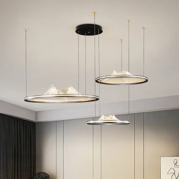 Серия кольцевых люстр с LED-подсветкой по внешнему контуру и фигурным рассеивателем с точечной гравировкой внутри OSMO D40+60+80 от ImperiumLoft