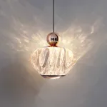 Серия светодиодных подвесных светильников с фигурным прозрачным плафоном и лифтовой регулировкой высоты с лифтом GRAMMA Gold с лифтом и бесконтактным переключением от ImperiumLoft