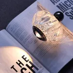 Серия светодиодных подвесных светильников с фигурным прозрачным плафоном и лифтовой регулировкой высоты с лифтом GRAMMA Gold с лифтом и бесконтактным переключением от ImperiumLoft