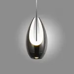 Серия подвесных светильников оригинальной формы с LED-подсветкой по внутреннему контуру и направленным вниз линзированным источников света CAJUS Black