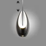 Серия подвесных светильников оригинальной формы с LED-подсветкой по внутреннему контуру и направленным вниз линзированным источников света CAJUS Black с лифтом