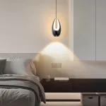 Серия подвесных светильников оригинальной формы с LED-подсветкой по внутреннему контуру и направленным вниз линзированным источников света CAJUS Black