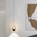 Серия подвесных светильников оригинальной формы с LED-подсветкой по внутреннему контуру и направленным вниз линзированным источников света CAJUS Black