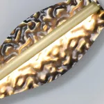 Серия светодиодных настенных светильников с латунным корпусом волнистой формы и рельефной поверхностью с чернением MILIUS WAVY L80 от ImperiumLoft
