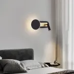 Серия настенных светильников в виде комбинации диска с LED подсветкой и поворотного спота на общем удлиненном креплении MAC Black от ImperiumLoft