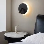 Серия разноцветных настенных светильников в виде диска с LED подсветкой по дуге и поворотным спотом DOM Black от ImperiumLoft
