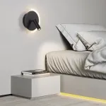 Серия разноцветных настенных светильников в виде диска с LED подсветкой по дуге и поворотным спотом DOM Black от ImperiumLoft