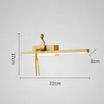 Серия настенных светильников с человеческой фигуркой на полочке с LED подсветкой REMUS BENCH Brass от ImperiumLoft Серия настенных светильников с человеческой фигуркой на полочке с LED подсветкой REMUS BENCH Brass от ImperiumLoft