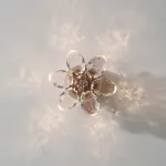 Серия настенных светильников из ограненного хрусталя в виде цветов с каркасом из металла EGEL B WALL P1 ImperiumLoft