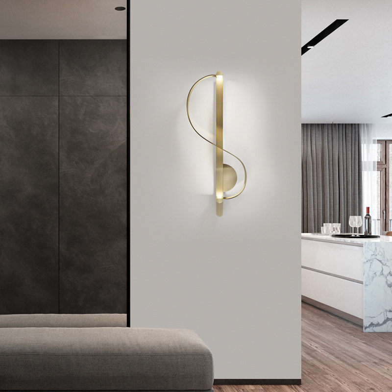 Настенный светильник Swoop Sconce изящной формы от Vinsa