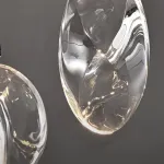 Настенный светильник в виде выгнутого диска с LED подсветкой Бра AQUILA WALL Black от ImperiumLoft