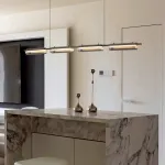 Серия реечных светильников с LED-источниками света внутри цилиндрических плафонов SIMER LONG L126 Brass от ImperiumLoft