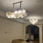 Серия люстр с многоярусным абажуром из подвесок в виде листьев гинкго из матового и прозрачного стекла и из металла LILLEN B D65 от ImperiumLoft