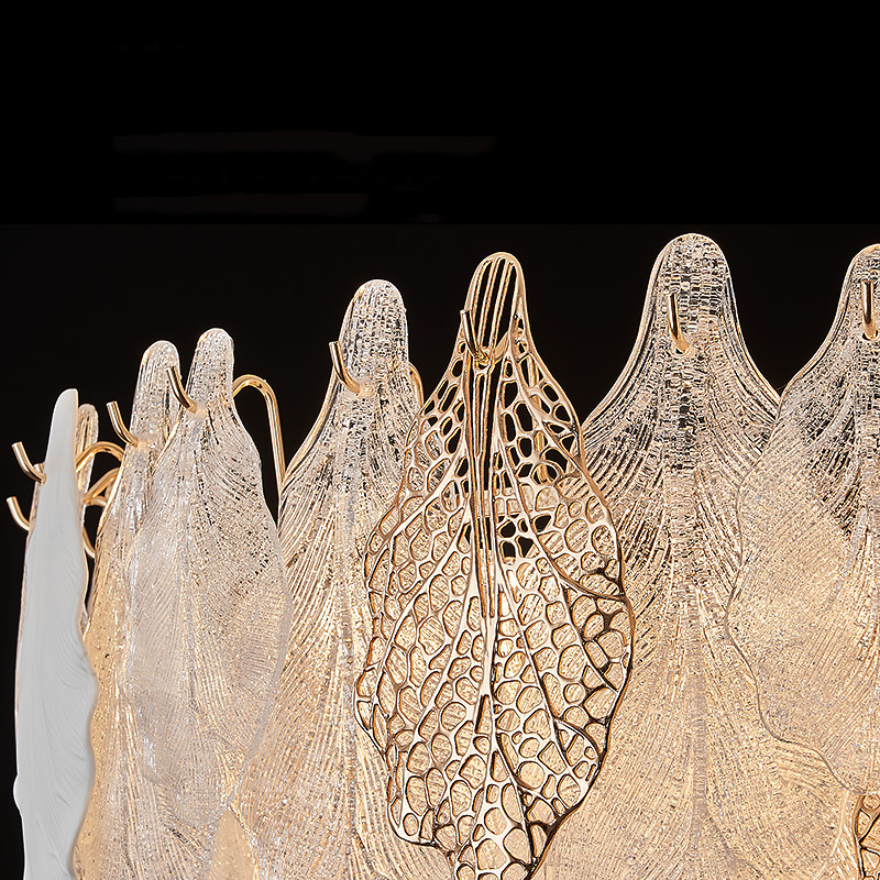 Серия люстр с многоярусным абажуром из подвесок в виде листьев из стекла, металла и керамики OLEANDER от ImperiumLoft Серия люстр с многоярусным абажуром из подвесок в виде листьев из стекла, металла и керамики OLEANDER от ImperiumLoft