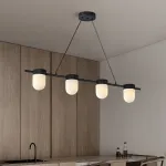 Реечный светильник с округлыми плафонами из натурального алебастра TORVILL LONG Brass L4 от ImperiumLoft
