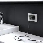 Розетка влагозащищенная с заземлением и шторками, без рамки с крышкой Werkel черные W1172208 от ImperiumLoft