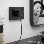 Розетка влагозащищенная с заземлением и шторками, без рамки с крышкой Werkel черные W1172208 от ImperiumLoft