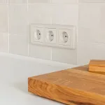 Розетка с заземлением и шторками, без рамки Werkel перламутровый рифленый W1171113