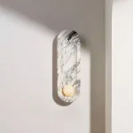 Настенный светильник Stone Embrace A с плафоном из мрамора от VINSA