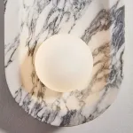 Настенный светильник Stone Embrace A с плафоном из мрамора от VINSA