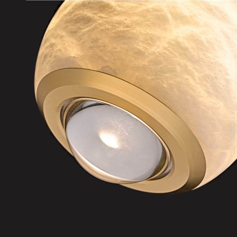 Подвесной светильник HENNEKE MARBLE Cloud Marble A с шарообразным плафоном из натурального мрамора Подвесной светильник HENNEKE MARBLE Cloud Marble A с шарообразным плафоном из натурального мрамора