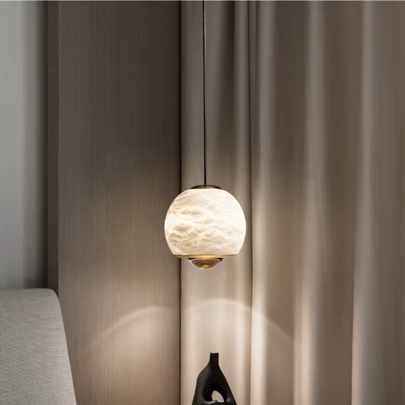 Подвесной светильник HENNEKE MARBLE Cloud Marble A с шарообразным плафоном из натурального мрамора Подвесной светильник HENNEKE MARBLE Cloud Marble A с шарообразным плафоном из натурального мрамора