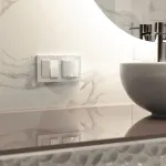 Розетка влагозащищенная с заземлением с защитной крышкой и шторками Werkel W1271201